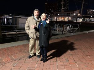 Dr. Doug Teti and Mina Shimizu standing outside at night.