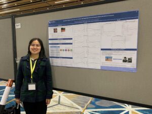 Tong Chen with their 2022 SPR award of distinction poster.