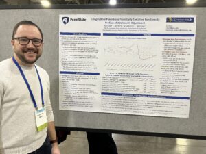 Michael T. Sanders and poster at 2023 SRCD