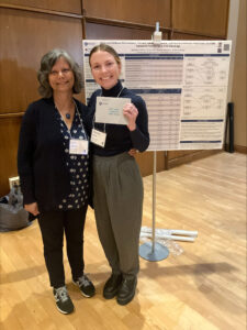 Professor Rina D. Eiden and Madison Kelm with first place 2024 CMSN conference poster