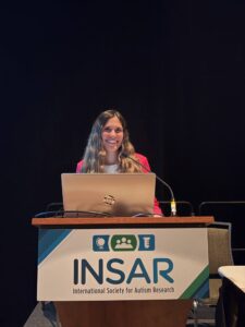 Hunter Mattern standing behind podium at INSAR 2025